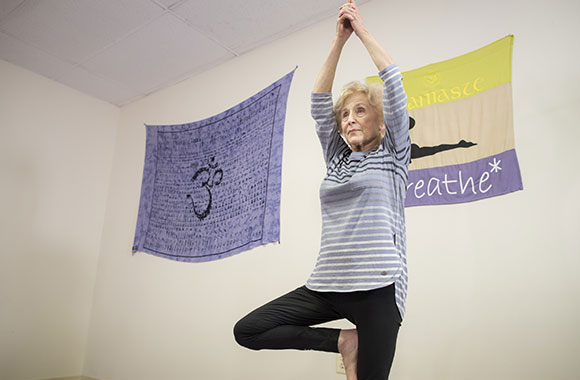 Holocaust survivor Susan Warsinger stays fit practicing yoga, which helps her continue her Musuem volunteer activities